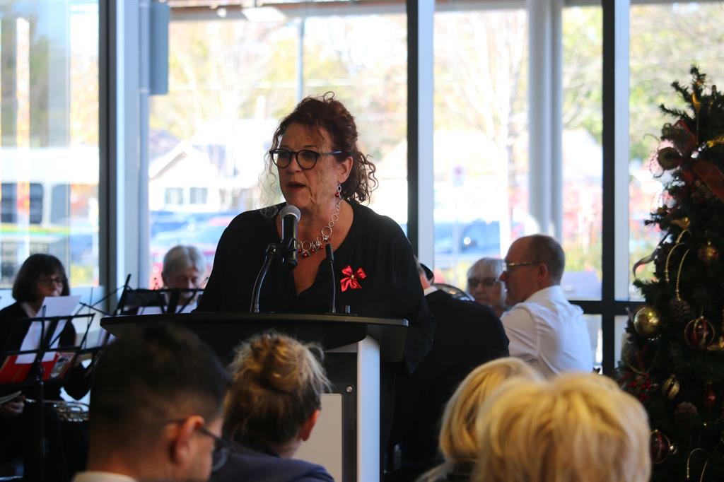 Person speaking at a podium